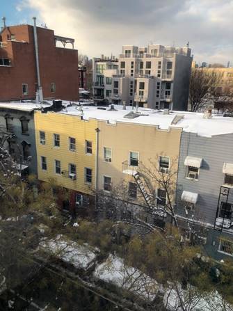 A picture containing building, outdoor, sky, city Description automatically generated